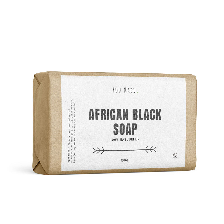 A close-up of African Black Soap (Zwarte Zeep), a fantastic skin and hair cleanser made with West African plants and barks. Deeply cleanses and regenerates skin cells. Use for body and face by lathering a small piece in wet hands, applying to the skin, and rinsing off. Can also be used as a shampoo for hair. Best stored in a dry place. Hydrate skin with Shea Butter or argan oil after cleansing.